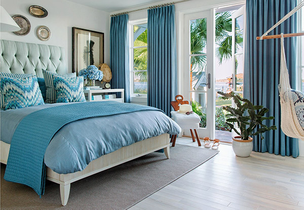 Thiết kế nội thất phòng ngủ hiện đại và tiện nghi phối hợp với một màu xanh bắt mắt