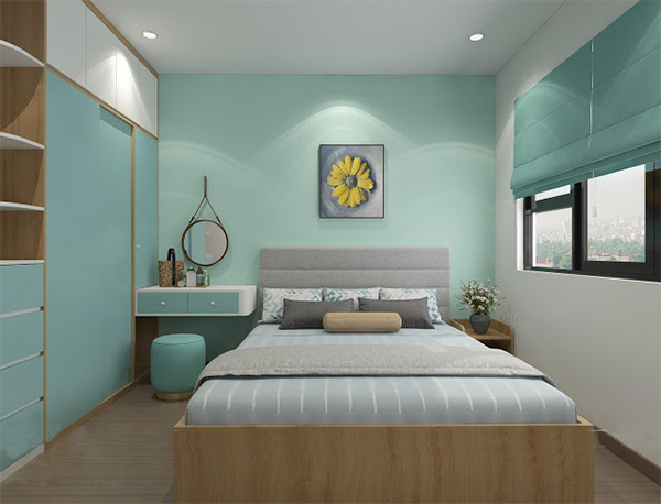 Phòng ngủ kết hợp màu xanh ngọc với nội thất vân gỗ tạo nên một tổng thể hài hòa và cuốn hút 